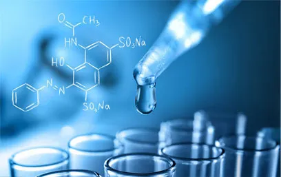 Precision pipette dispensing liquid over test tubes during formulation research