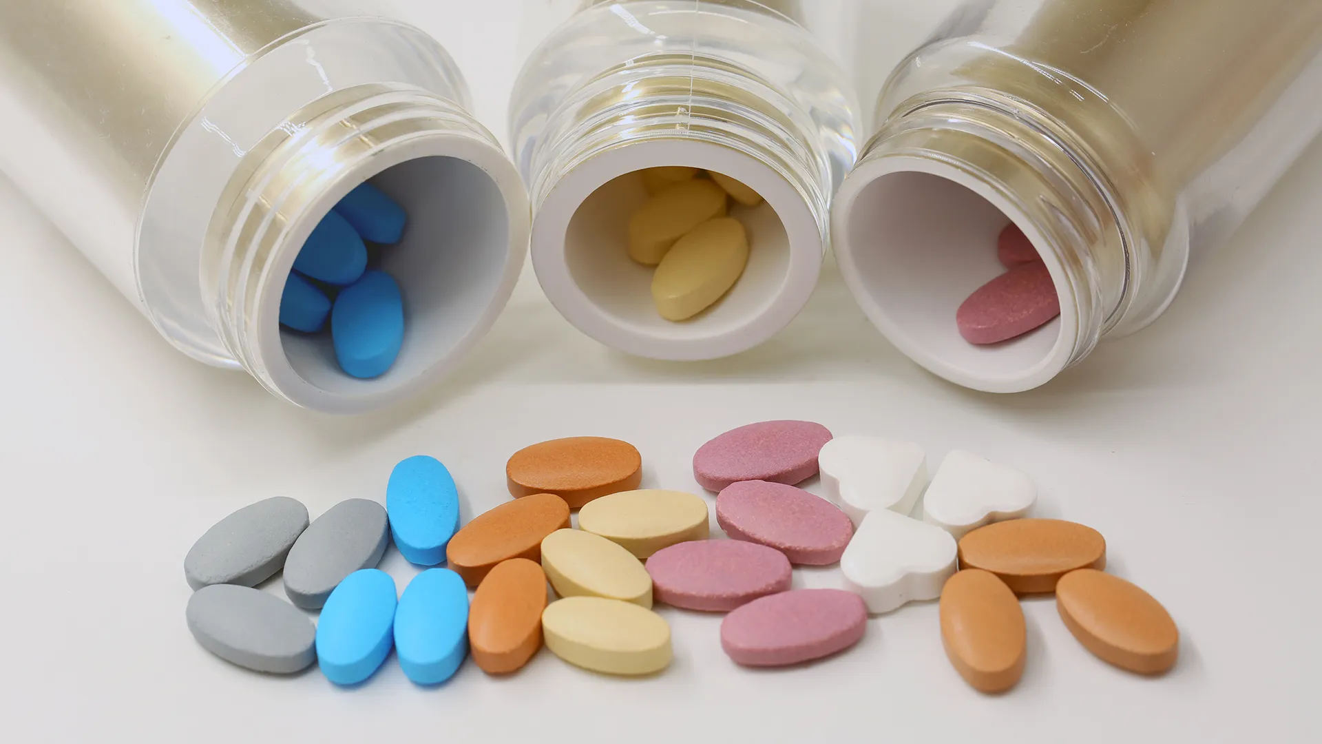 Health supplement tablets and bottles representing nutraceutical industry insights